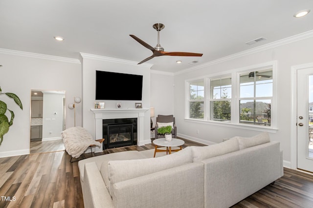 2128 Jollay St, Durham, NC 27703 - living room featuring a ceiling fan, recessed lighting, wood finished floors, crown molding, and baseboards