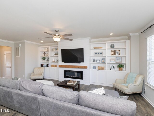 601 Grand Central Sta, Apex, NC 27502 - living area with dark wood-style flooring, ornamental molding, a ceiling fan, recessed lighting, and baseboards