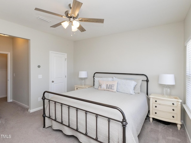 601 Grand Central Sta, Apex, NC 27502 - bedroom featuring light colored carpet, baseboards, and ceiling fan