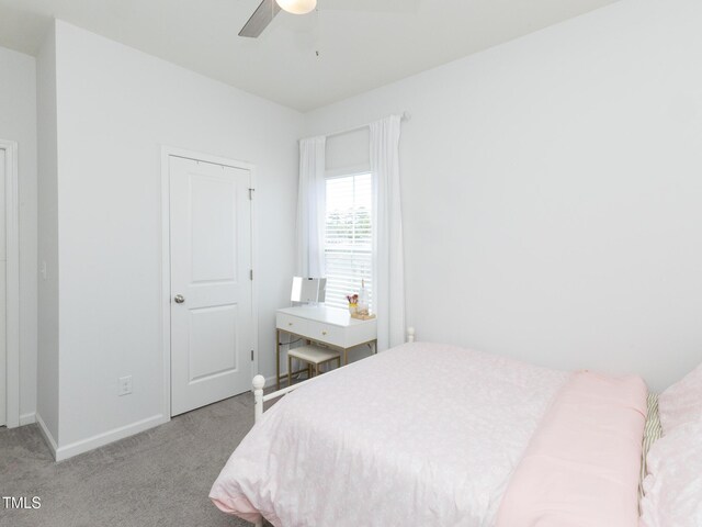 601 Grand Central Sta, Apex, NC 27502 - bedroom with light colored carpet, baseboards, and ceiling fan