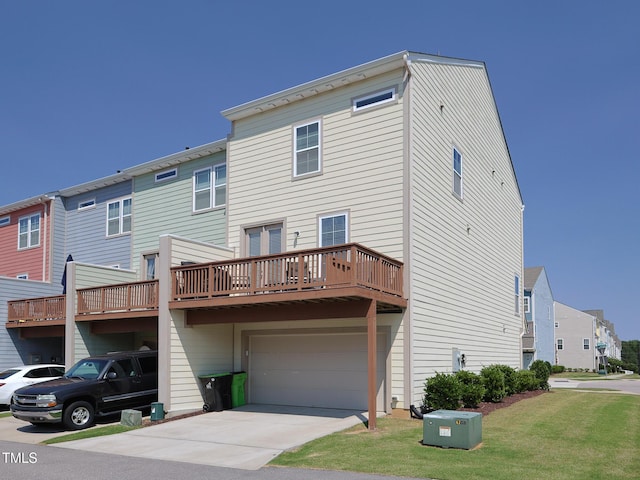 601 Grand Central Sta, Apex, NC 27502 - rear view of property featuring a garage, a lawn, concrete driveway, and a deck