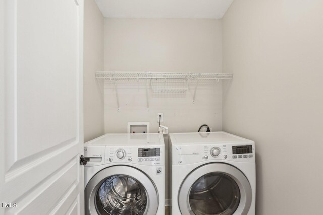 8204 Yaxley Hall Dr, Raleigh, NC 27616 - washroom featuring washing machine and dryer