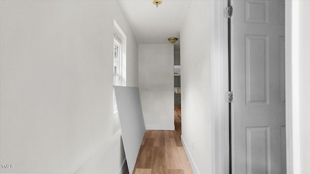 2396 Spring Valley Rd, Henderson, NC 27537 - hall with light wood-type flooring and baseboards