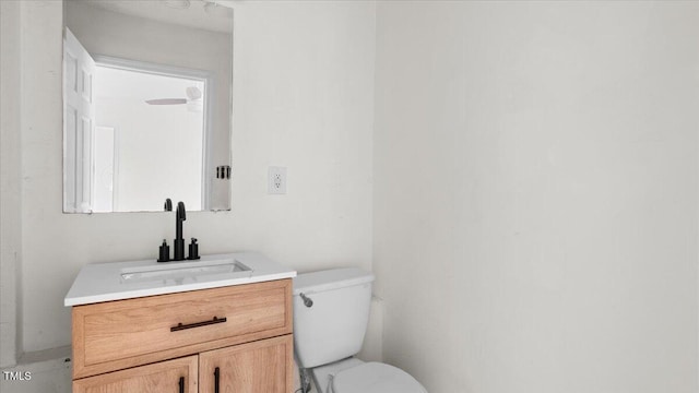 2396 Spring Valley Rd, Henderson, NC 27537 - half bathroom featuring vanity and toilet