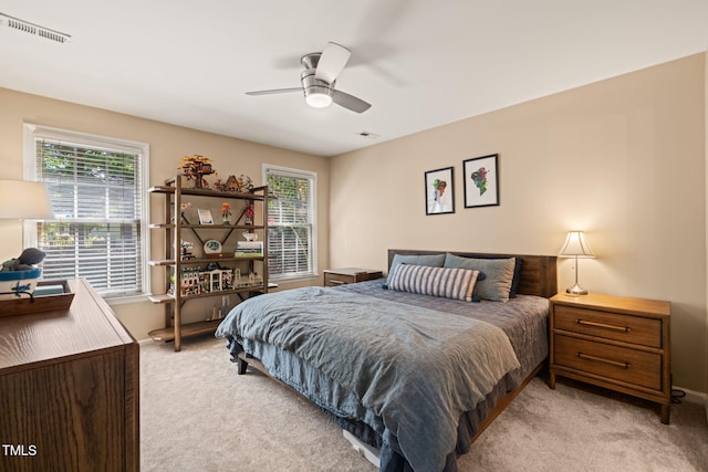 1 Lake Hill Dr, Durham, NC 27713 - bedroom with light carpet, baseboards, and a ceiling fan