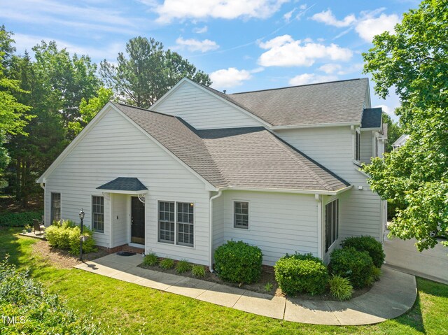 1 Lake Hill Dr, Durham, NC 27713 - view of front of house with a shingled roof and a front lawn