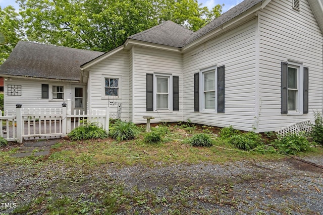 819 Corbin St, Albemarle, NC 28001 - view of side of home with a shingled roof