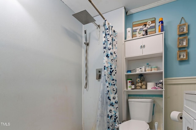 819 Corbin St, Albemarle, NC 28001 - full bathroom featuring a shower with curtain, a wainscoted wall, and toilet