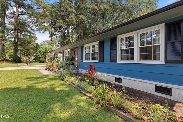 509 Forest Ridge Rd, Garner, NC 27529 - view of property exterior featuring crawl space and a lawn