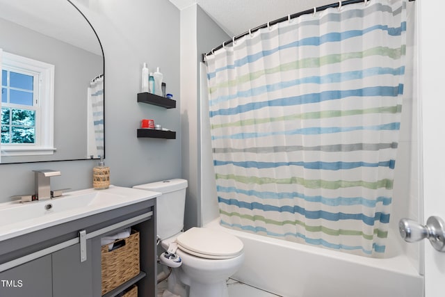 509 Forest Ridge Rd, Garner, NC 27529 - bathroom featuring vanity, shower / bath combo, and a textured ceiling