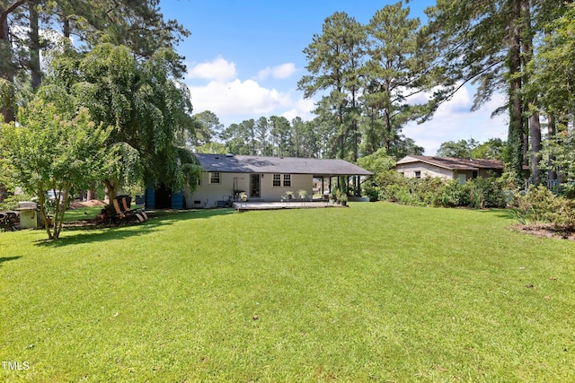 509 Forest Ridge Rd, Garner, NC 27529 - view of green lawn featuring a patio area