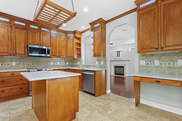 104 Shady Ridge Ct, Apex, NC 27502 - kitchen featuring stainless steel appliances, open shelves, backsplash, light countertops, and recessed lighting
