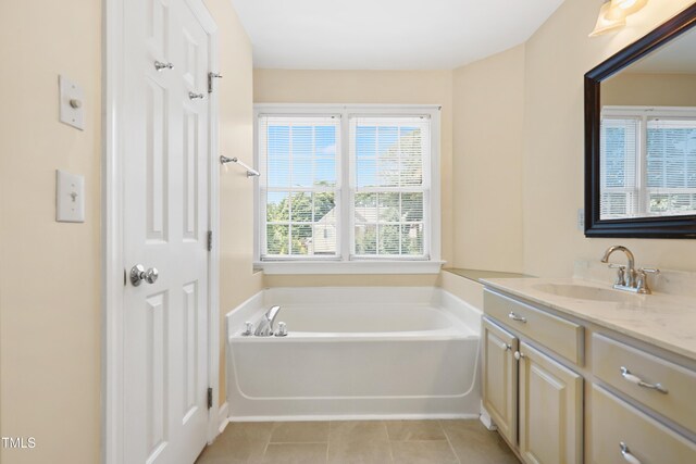 104 Shady Ridge Ct, Apex, NC 27502 - full bathroom featuring vanity, a bath, and tile patterned floors