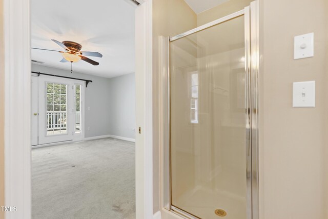 104 Shady Ridge Ct, Apex, NC 27502 - bathroom with a stall shower, a ceiling fan, and baseboards