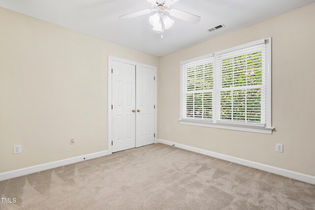 104 Shady Ridge Ct, Apex, NC 27502 - unfurnished bedroom with baseboards, carpet, and a closet