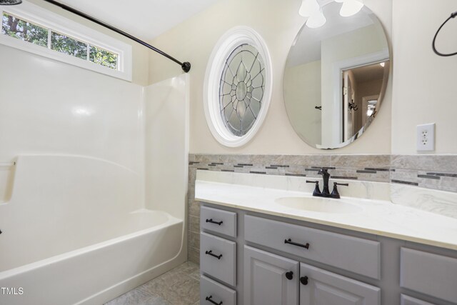 104 Shady Ridge Ct, Apex, NC 27502 - bathroom with vanity and bathing tub / shower combination