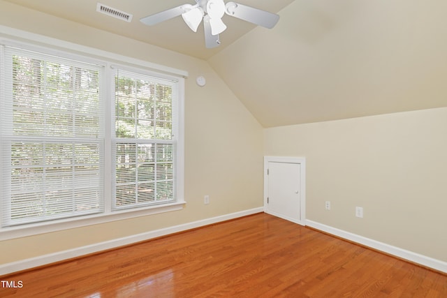 104 Shady Ridge Ct, Apex, NC 27502 - bonus room with wood finished floors, baseboards, lofted ceiling, and a ceiling fan
