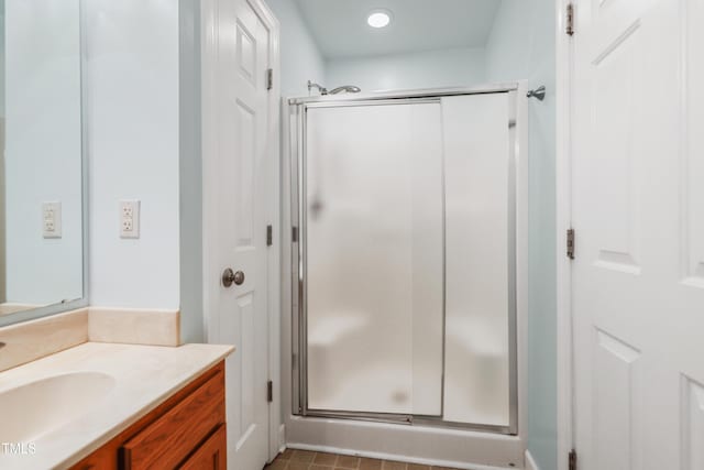 104 Shady Ridge Ct, Apex, NC 27502 - bathroom with vanity, a shower stall, and recessed lighting