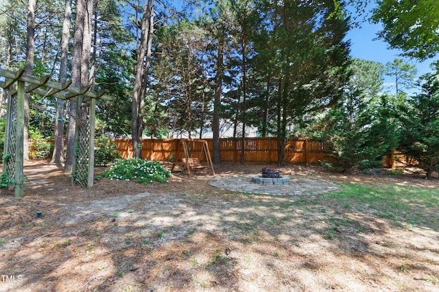 104 Shady Ridge Ct, Apex, NC 27502 - view of yard featuring an outdoor fire pit