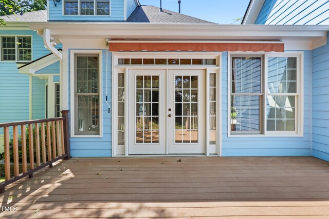 104 Shady Ridge Ct, Apex, NC 27502 - doorway to property featuring french doors, a wooden deck, and a shingled roof