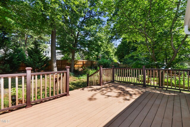 104 Shady Ridge Ct, Apex, NC 27502 - wooden deck with a fenced backyard