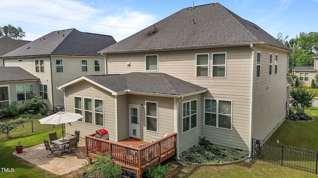 3032 Curling Creek Dr, Apex, NC 27502 - back of property with a fenced backyard, a patio, a deck, and a shingled roof