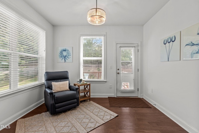 3032 Curling Creek Dr, Apex, NC 27502 - living area featuring a chandelier and wood finished floors