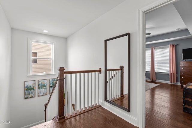 3032 Curling Creek Dr, Apex, NC 27502 - hall featuring an upstairs landing, dark wood-type flooring, and recessed lighting