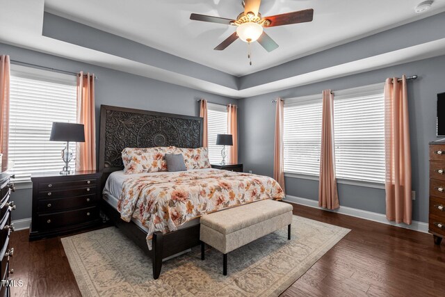 3032 Curling Creek Dr, Apex, NC 27502 - bedroom with dark wood-style flooring and a ceiling fan
