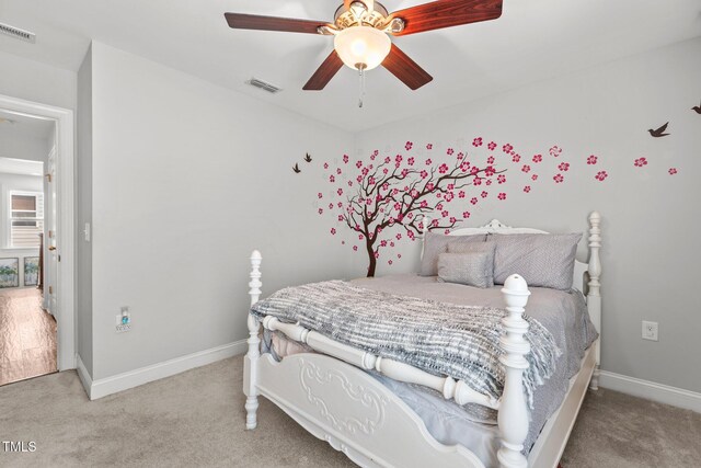 3032 Curling Creek Dr, Apex, NC 27502 - carpeted bedroom with baseboards and ceiling fan