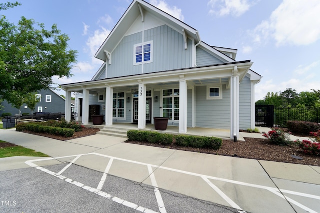 421 Old Ride Dr, Holly Springs, NC 27540 - view of front of house featuring a porch and uncovered parking