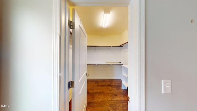 421 Old Ride Dr, Holly Springs, NC 27540 - spacious closet with dark wood finished floors