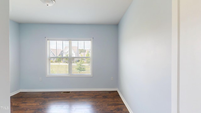 421 Old Ride Dr, Holly Springs, NC 27540 - unfurnished room with dark wood-style flooring and baseboards