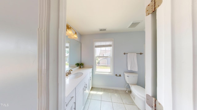 421 Old Ride Dr, Holly Springs, NC 27540 - bathroom featuring toilet, vanity, tile patterned flooring, and baseboards