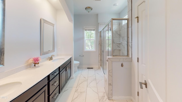 421 Old Ride Dr, Holly Springs, NC 27540 - bathroom featuring double vanity, toilet, marble finish floors, and a marble finish shower