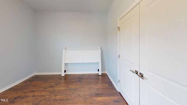421 Old Ride Dr, Holly Springs, NC 27540 - washroom featuring dark wood-type flooring and baseboards