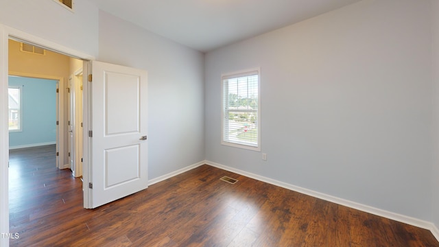 421 Old Ride Dr, Holly Springs, NC 27540 - empty room featuring baseboards and dark wood-type flooring