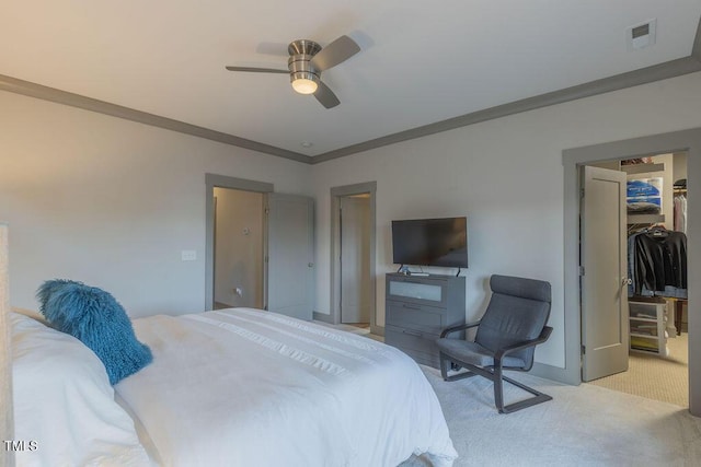 1624 Tunnel St, Wendell, NC 27591 - bedroom with light colored carpet, a spacious closet, crown molding, ceiling fan, and a closet