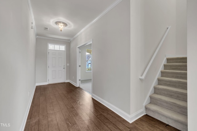 428 Mill Station Ln, Wendell, NC 27591 - entryway featuring stairway, ornamental molding, and dark wood finished floors