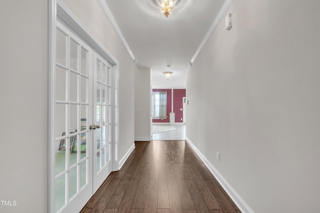 428 Mill Station Ln, Wendell, NC 27591 - hall with french doors, dark wood finished floors, and ornamental molding