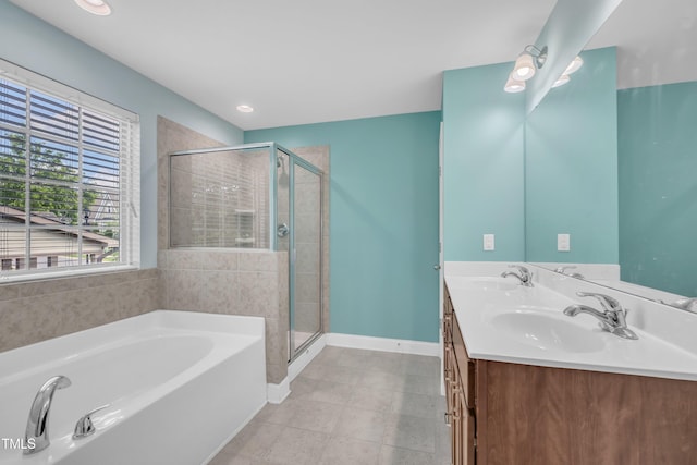 428 Mill Station Ln, Wendell, NC 27591 - full bathroom featuring a bath, a shower stall, and double vanity
