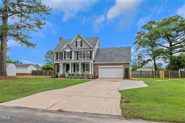 248 Robin Loop, Dunn, NC 28334 - traditional-style house with brick siding, concrete driveway, a chimney, a garage, and a porch