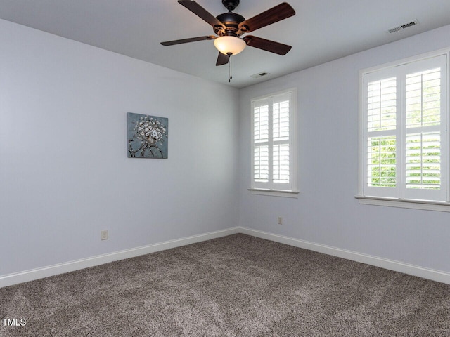 612 Peach Orchard Pl, Cary, NC 27519 - carpeted empty room featuring healthy amount of natural light, a ceiling fan, and baseboards