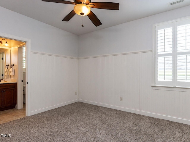 612 Peach Orchard Pl, Cary, NC 27519 - empty room featuring light carpet and ceiling fan