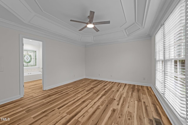 2913 Coxindale Dr, Raleigh, NC 27615 - unfurnished bedroom featuring ornamental molding, light wood-style floors, ensuite bathroom, and a ceiling fan