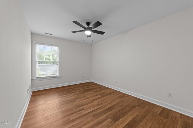 2913 Coxindale Dr, Raleigh, NC 27615 - spare room with wood finished floors and a ceiling fan