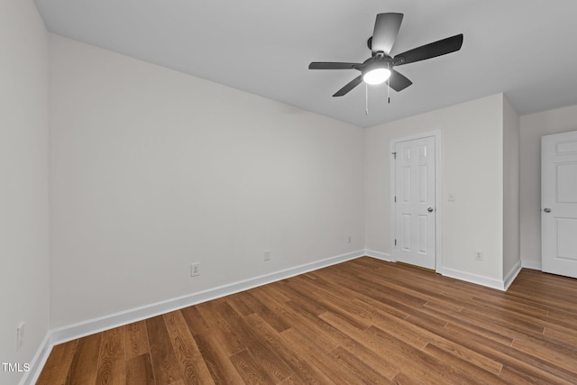2913 Coxindale Dr, Raleigh, NC 27615 - unfurnished bedroom with wood finished floors and ceiling fan