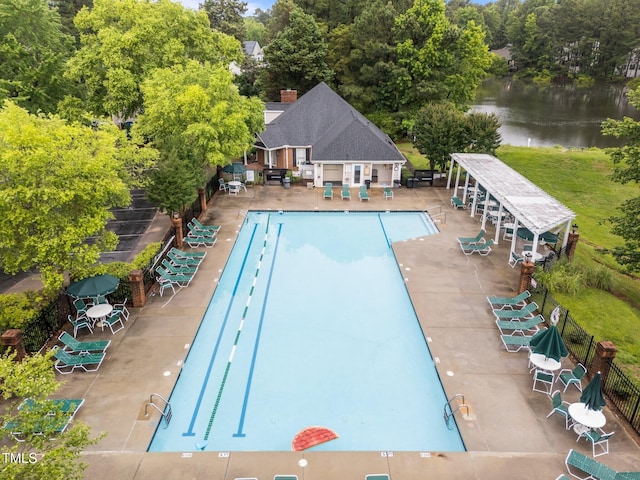2913 Coxindale Dr, Raleigh, NC 27615 - view of pool with a water view and view of wooded area