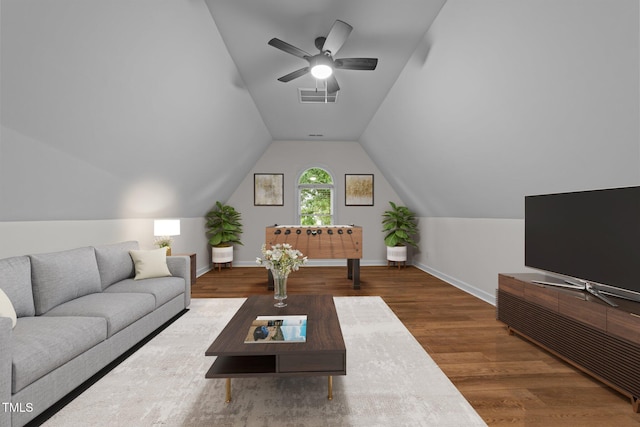 2913 Coxindale Dr, Raleigh, NC 27615 - living room featuring vaulted ceiling, wood finished floors, and a ceiling fan