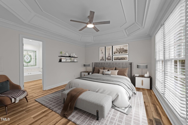 2913 Coxindale Dr, Raleigh, NC 27615 - bedroom with crown molding, light wood finished floors, ensuite bath, and a ceiling fan